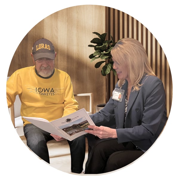 A man is shown a brochure